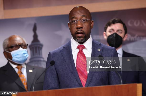 Sen. Raphael Warnock speaks on medicare expansion and the reconciliation package during a press conference with fellow lawmakers at the U.S. Capitol...