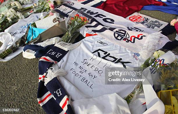 Tributes to footballer and ex Bolton Wanderers player Gary Speed are seen outside the Reebok Stadium the home ground of Bolton Wanderers FC on...