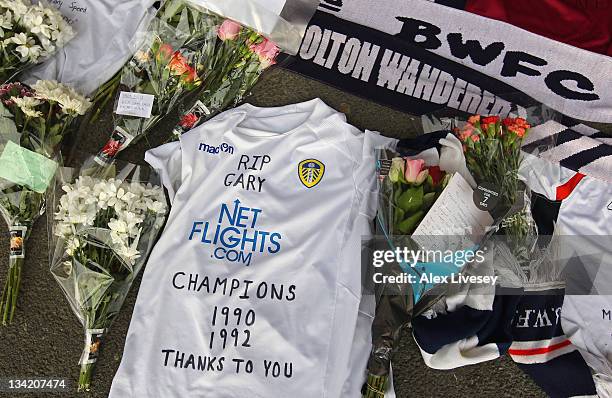 Leeds United shirt is seen amongst tributes to footballer and ex Bolton Wanderers player Gary Speed outside the Reebok Stadium the home ground of...