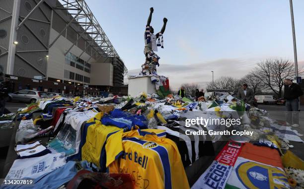Tributes are left at the Billy Bremner statue outside Elland Road football ground in memory of former player Leeds United Gary Speed on November 28,...