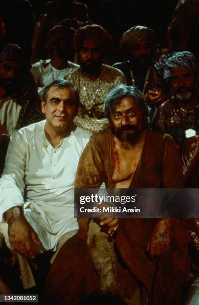 Portrait of Indian film producer Ismail Merchant and British-Indian actor Saeed Jaffrey , along with other cast members, during the filming of 'The...