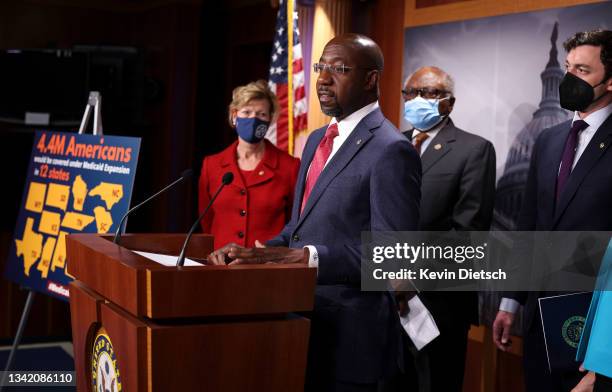 Sen. Raphael Warnock speaks on medicare expansion and the reconciliation package during a press conference with fellow lawmakers at the U.S. Capitol...