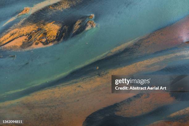 abstract drone shot above a riverbed, iceland - riverbed ストックフォトと画像