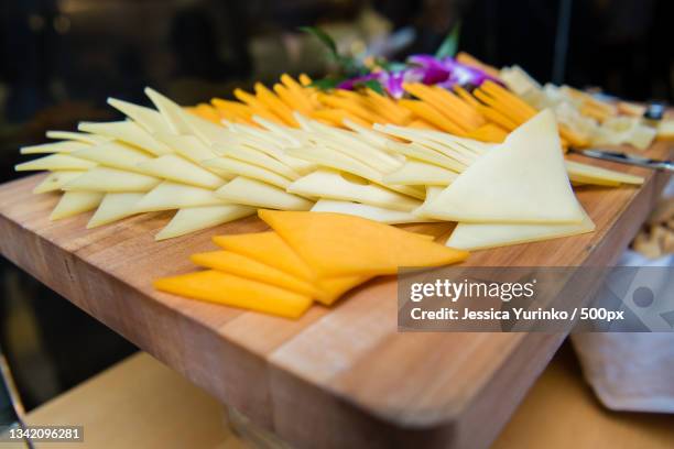 close-up of pineapple slices on cutting board - cheese spread ストックフォトと画像