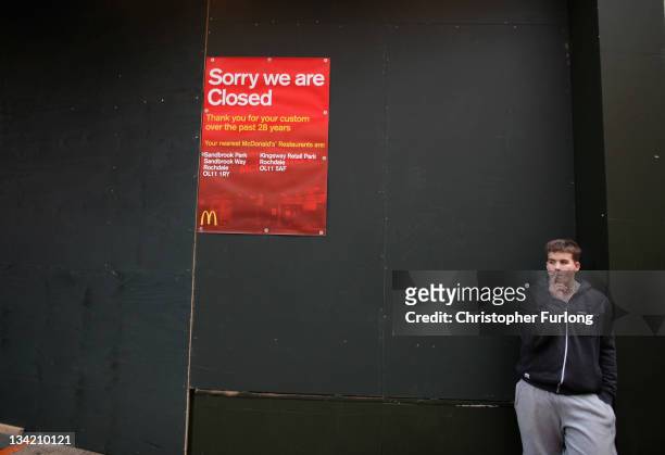 Youth smokes a cigarette outside the closed down MacDonald's restaurant on November 28, 2011 in Rochdale, England. Global fast food chain MacDonald's...