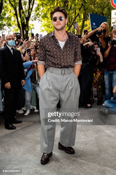 Niall Horan poses ahead of the Emporio Armani fashion show during the Milan Fashion Week - Spring / Summer 2022 on September 23, 2021 in Milan, Italy.