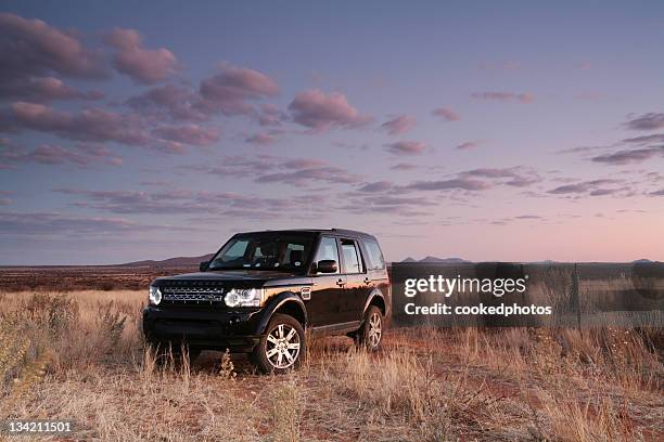 land rover discovery 4 - land rover discovery stock pictures, royalty-free photos & images