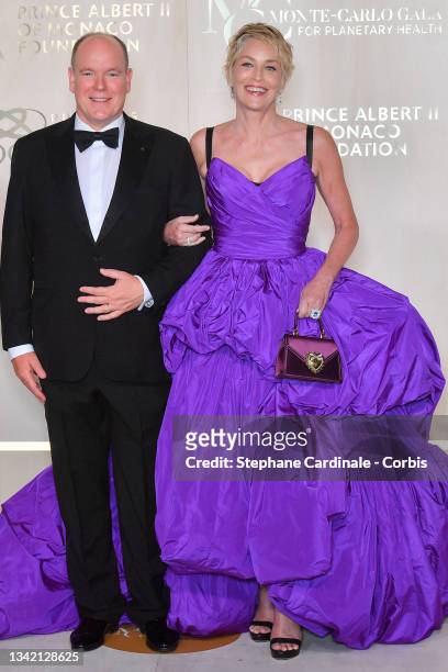 Prince Albert II of Monaco and Sharon Stone attend the photocall during the 5th Monte-Carlo Gala For Planetary Health on September 23, 2021 in...
