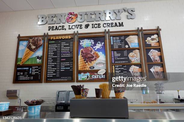 The menu hangs on the wall at a Ben & Jerry's ice cream store on September 23, 2021 in Miami, Florida. The state of Florida is reported to be ready...