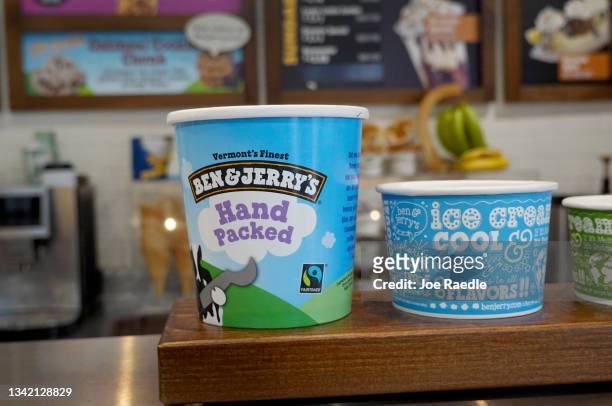 Ben & Jerry's ice cream container sits on the counter in one of their stores on September 23, 2021 in Miami, Florida. The state of Florida is...