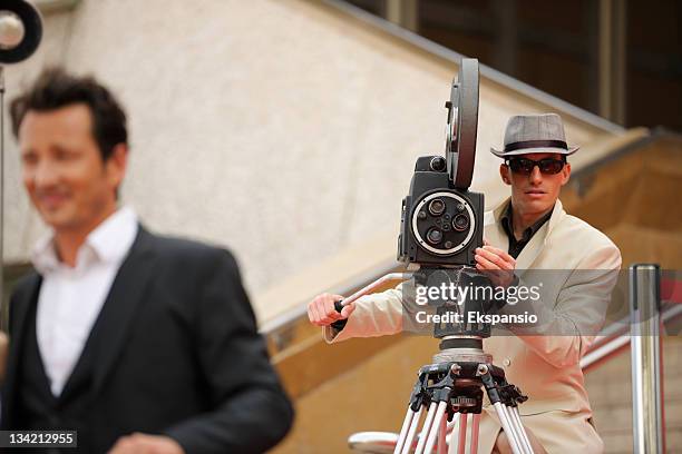 cameraman filming movie stars - camera lens stock pictures, royalty-free photos & images