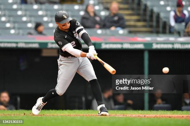 Cesar Hernandez of the Chicago White Sox hits a single during the sixth inning of game one of a double header against the Cleveland Indians at...