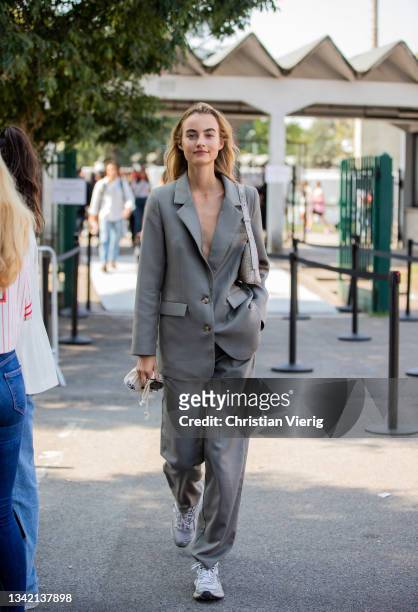 Maartje Verhoef is seen wearing grey suit outside Boss during the Milan Fashion Week - Spring / Summer 2022 on September 23, 2021 in Milan, Italy.
