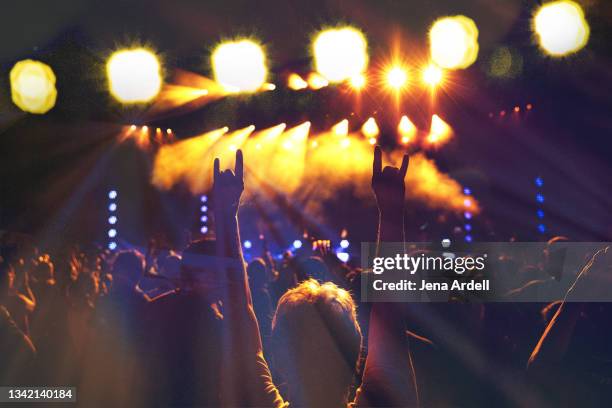 concert crowd hands - touring music festival stock pictures, royalty-free photos & images