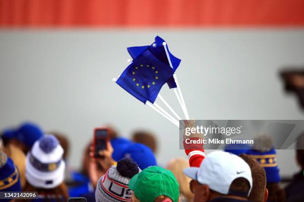 Fans wave European Union flags during the opening ceremony for the 43rd Ryder Cup at Whistling Straits on September 23, 2021 in Kohler, Wisconsin.