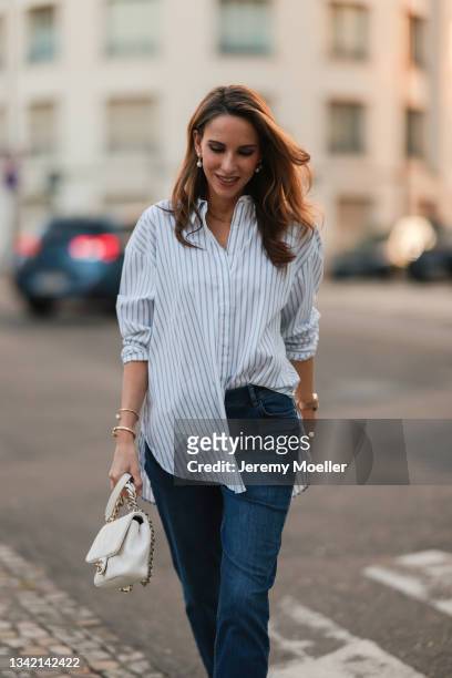 Alexandra Lapp wearing full comma fashion look and white Chanel leather bag on September 17, 2021 in Dusseldorf, Germany.