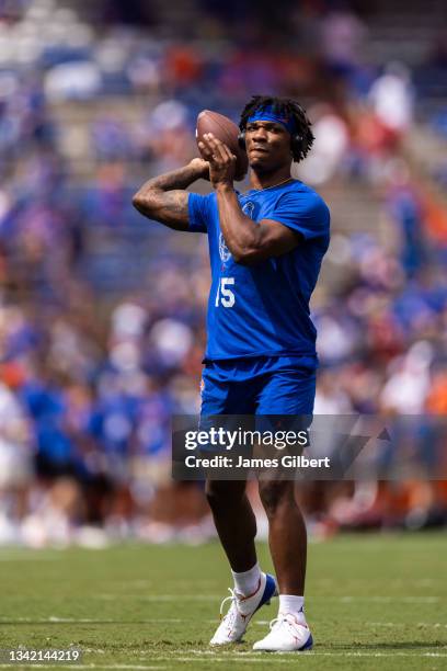 Anthony Richardson of the Florida Gators warms up before the start of a game against the Alabama Crimson Tide at Ben Hill Griffin Stadium on...