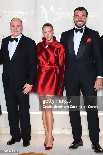 Prince Albert II of Monaco, Pauline Ducruet and Maxime Giaccardi attend the photocall during the 5th Monte-Carlo Gala For Planetary Health on...