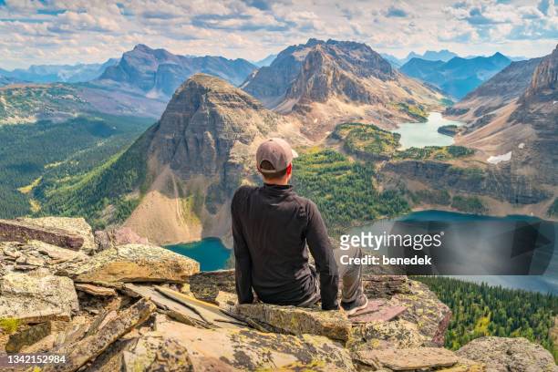 hiker canadian rockies egypt lake banff national park - banff national park stock pictures, royalty-free photos & images