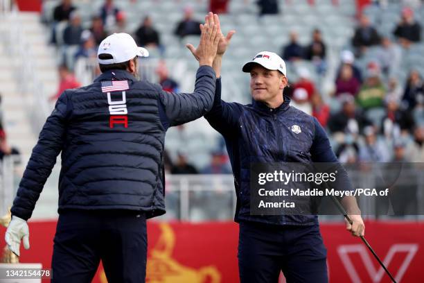 Rob Riggle and A.J. Hawk celebrate during the celebrity matches ahead of the 43rd Ryder Cup at Whistling Straits on September 23, 2021 in Kohler,...