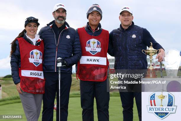 Rob Riggle and A.J. Hawk pose for photos on the first tee during the celebrity matches ahead of the 43rd Ryder Cup at Whistling Straits on September...