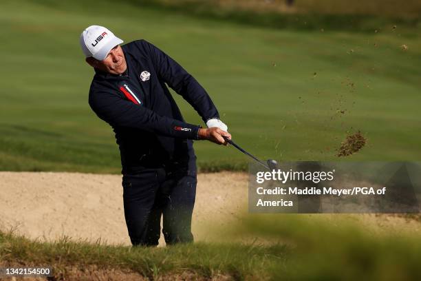 Dan Jansen plays his shot from the bunker on the first hole during the celebrity matches ahead of the 43rd Ryder Cup at Whistling Straits on...