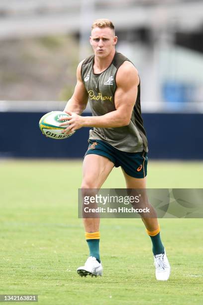 Reece Hodge shapes to pass during the Australian Wallabies captain's run at North Queensland Cowboys on September 24, 2021 in Townsville, Australia.