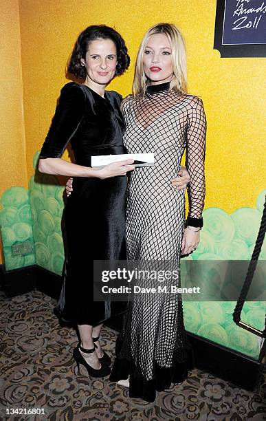 Winner of the Isabella Blow award Sam Gainsbury and model Kate Moss pose at the British Fashion Awards 2011 at The Savoy Hotel on November 28, 2011...