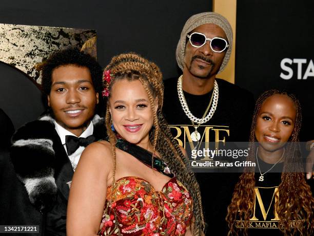 Demetrius Flenory Jr., Michole Briana White, Snoop Dogg and Shante Broadus attend the BMF world premiere screening and concert at Cellairis...