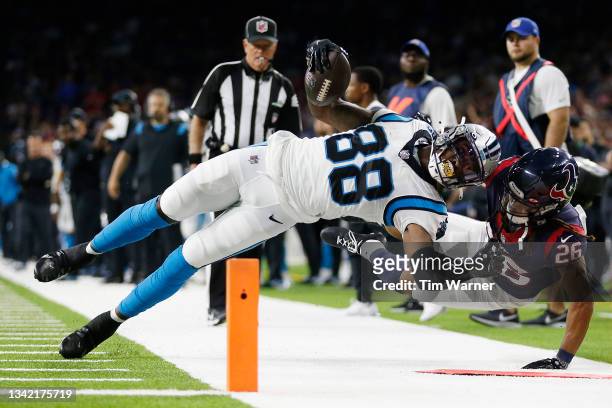 Terrace Marshall Jr. #88 of the Carolina Panthers is tackled just short of the goal line by Vernon Hargreaves III of the Houston Texans after a...