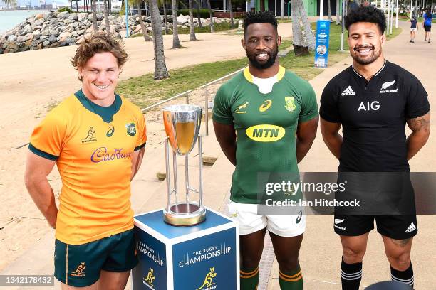 Michael Hooper of the Wallabies, Siya Kolisi of the Springboks and Ardie Savea of the All Blacks pose with the Rugby Championship trophy during a...