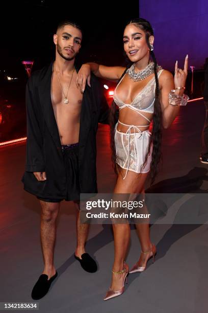 In this image released on September 23, Mena Massoud and Vanessa Hudgens are seen during Rihanna's Savage X Fenty Show Vol. 3 presented by Amazon...