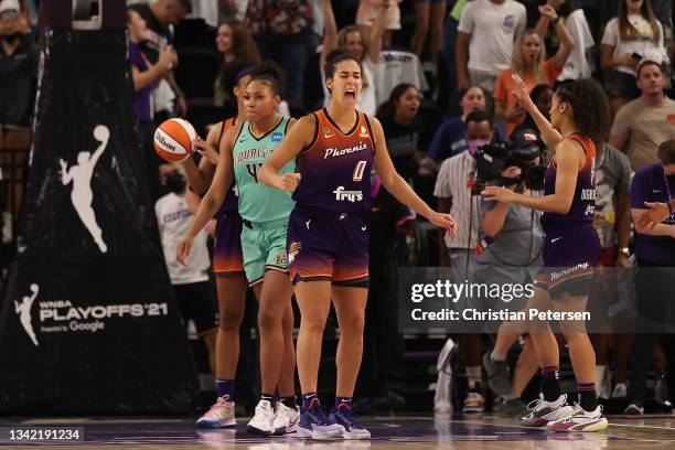 Kia Nurse of the Phoenix Mercury celebrates with Skylar Diggins-Smith after defeating the New York Liberty in the first round WNBA playoffs at Grand...