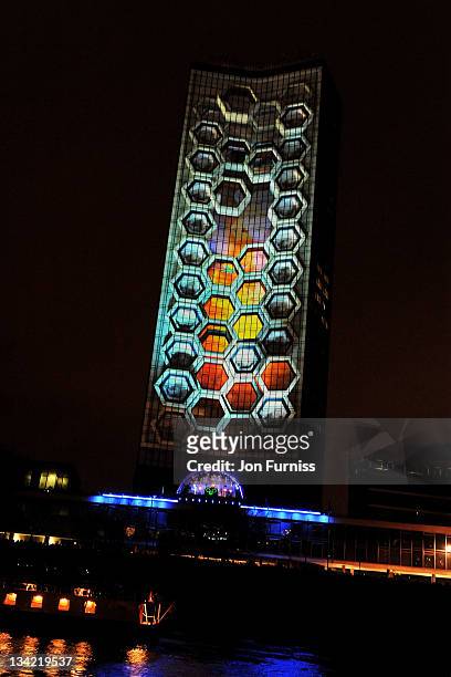 Milbank Tower is illuminated during the Nokia Lumia Live To Launch The Nokia Lumia 800 Smartphone Spectacle event on November 28, 2011 in London,...