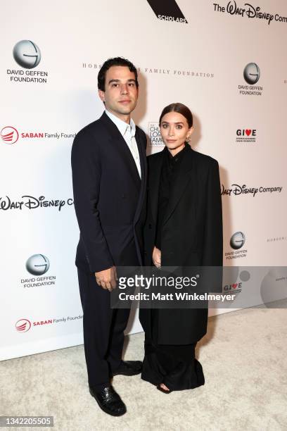 Louis Eisner and Ashley Olsen attend the YES 20th Anniversary Gala on September 23, 2021 in Los Angeles, California.