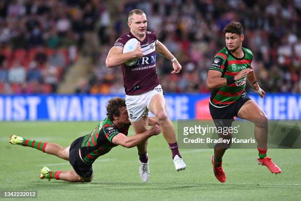 Tom Trbojevic of the Sea Eagles makes a break during the NRL Preliminary Final match between the South Sydney Rabbitohs and the Manly Sea Eagles at...