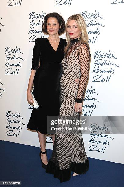 Sam Gainsbury and Kate Moss in the press room at the British Fashion Awards 2011 at The Savoy Hotel on November 28, 2011 in London, England.