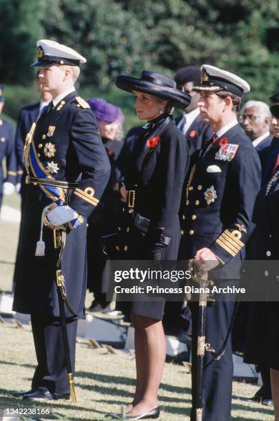 British Royal Diana, Princess of Wales , wearing a black Chanel suit and a Philip Somerville hat, and Charles, Prince of Wales in ceremonial uniform,...