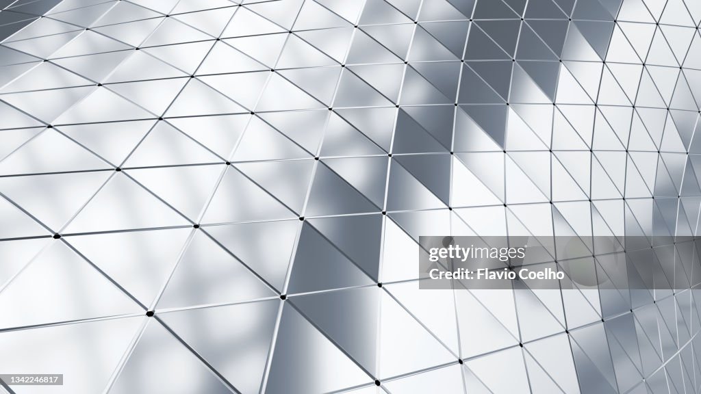 Shiny silver colored building facade background