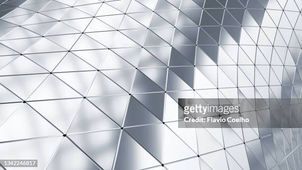 shiny silver colored building facade background - iron metal - fotografias e filmes do acervo