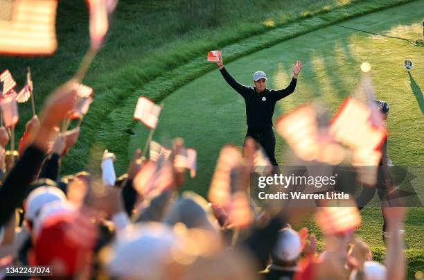 Justin Thomas of team United States interacts with fans around the first tee prior to Friday Morning Foursome Matches of the 43rd Ryder Cup at...