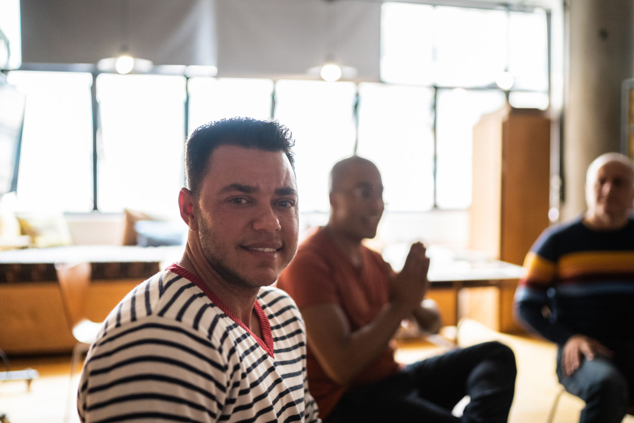 Portrait of a transgender mature man in group therapy or business meeting Portrait of a transgender mature man in group therapy or business meeting