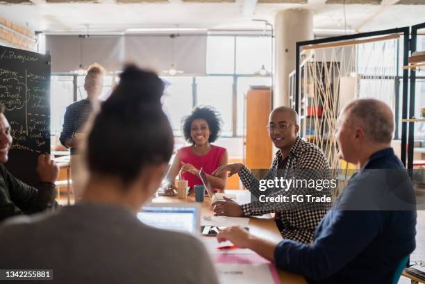 business meeting at work - employee development stock pictures, royalty-free photos & images