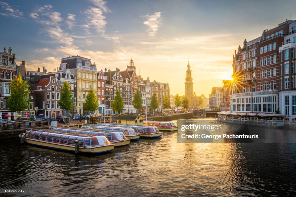 Sunset in Amsterdam with the Muntorren standing out