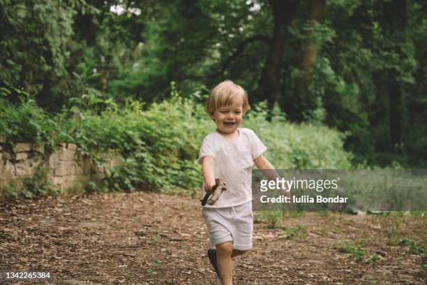 three years small cute boy playing - 2 3 years stock pictures, royalty-free photos & images