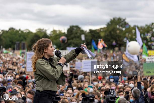 German Climate activist Luisa Neubauer speaks at a large-scale climate strike march by Fridays for Future in front of the Reichstag on September 24,...