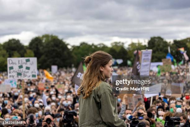 German Climate activist Luisa Neubauer speaks at a large-scale climate strike march by Fridays for Future in front of the Reichstag on September 24,...