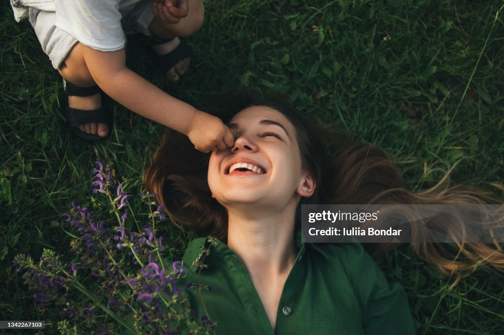 Mother and her child enjoy the early spring