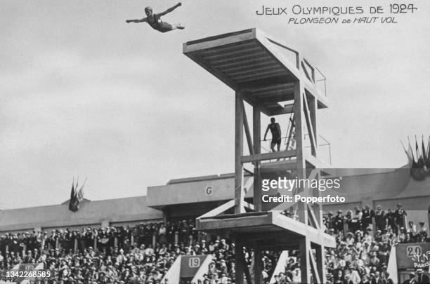 Spectators watch as an unspecified diver competes in the men's 10-metre platform of the 1924 Summer Olympics, held at the Piscine des Tourelles in...