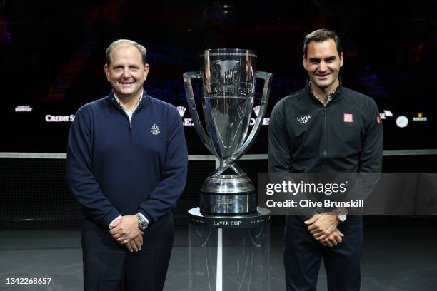 Tony Godsick Laver Cup Chairman and Roger Federer pose for a photograph with the Laver Cup Trophy after taking part in a live TV interview on CNBC at...